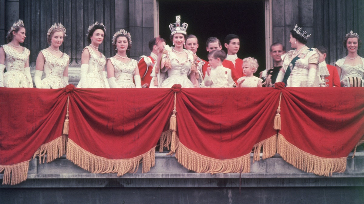 Queen Elizabeth II waving during her coronation