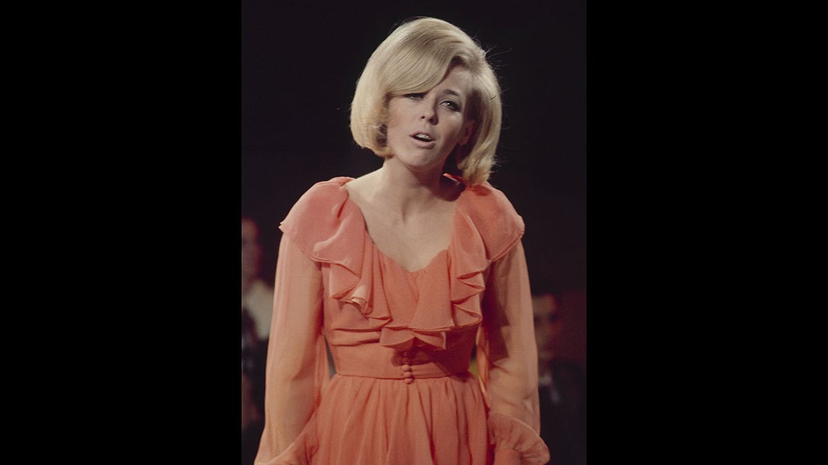 Tina Cole singing in a TV special