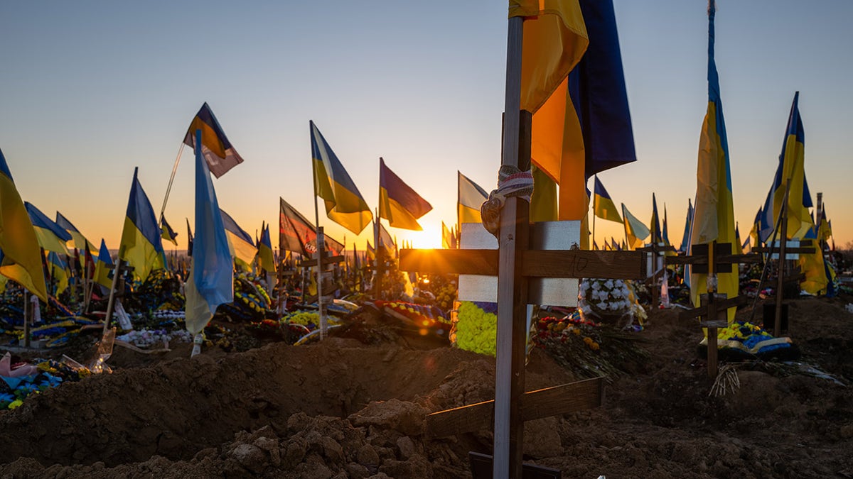 Ukrainian flags are planted in the graves of soldiers at a Kharkiv cemetery on Jan. 24, 2023 in Kharkiv, Ukraine. 