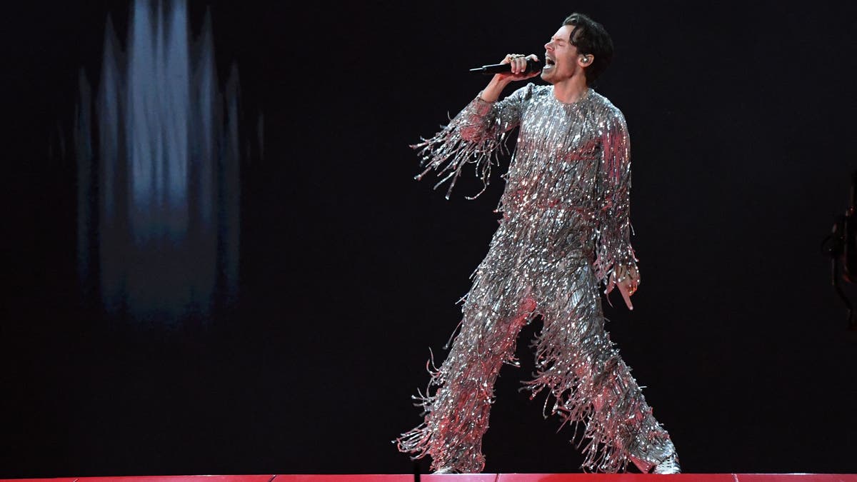 Singer Harry Styles wears glitter ensemble at Grammys