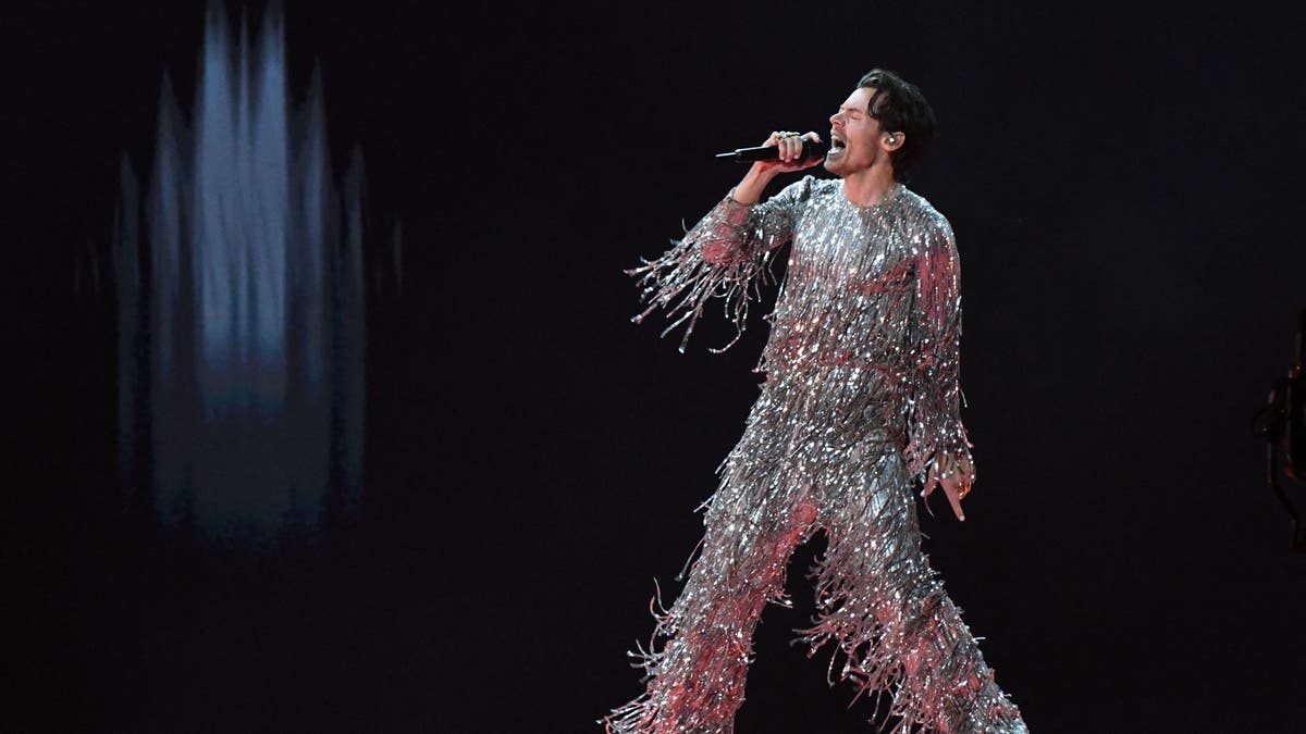 Singer Harry Styles wears glitter ensemble at Grammys