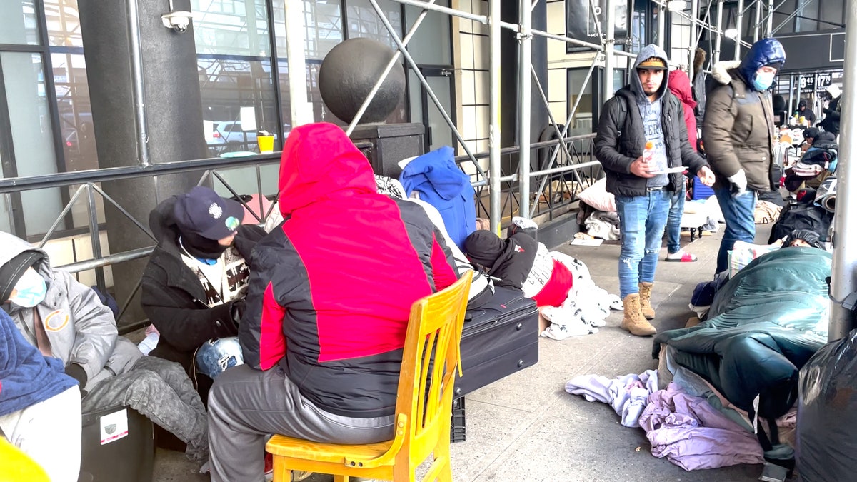 New York City migrants outside luxury hotel
