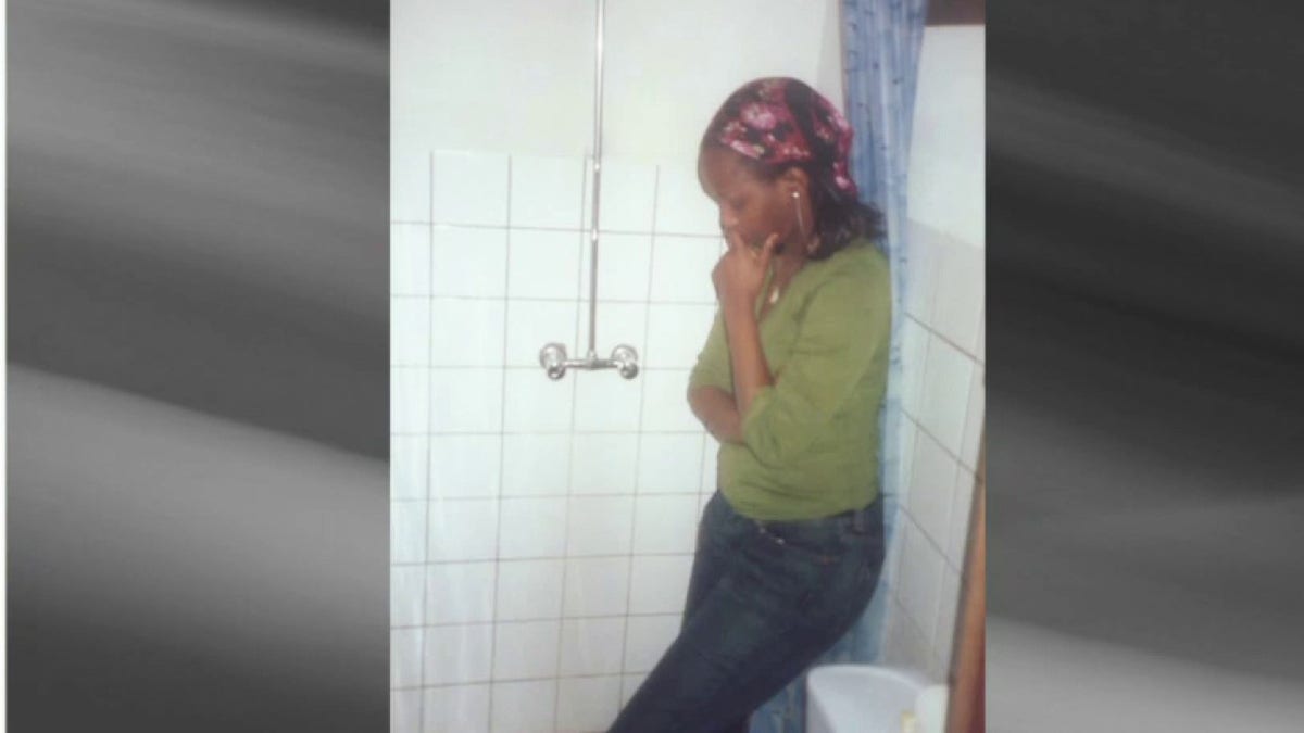 Immaculee Ilibagiza in bathroom