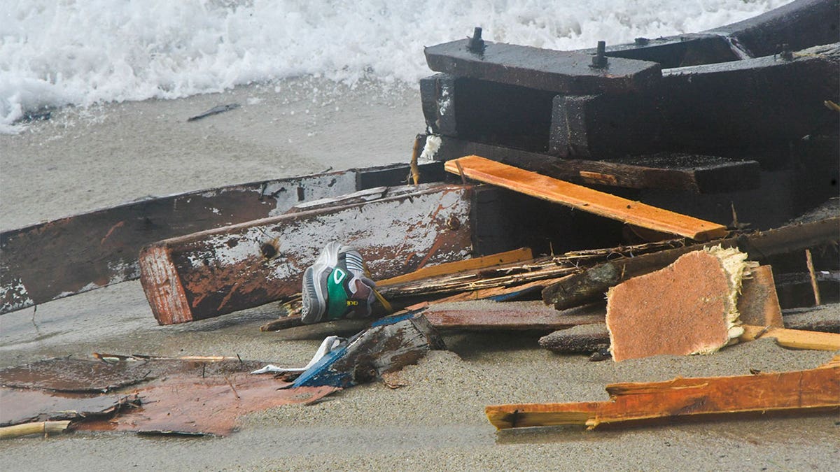 Wreckage washed up on shore.