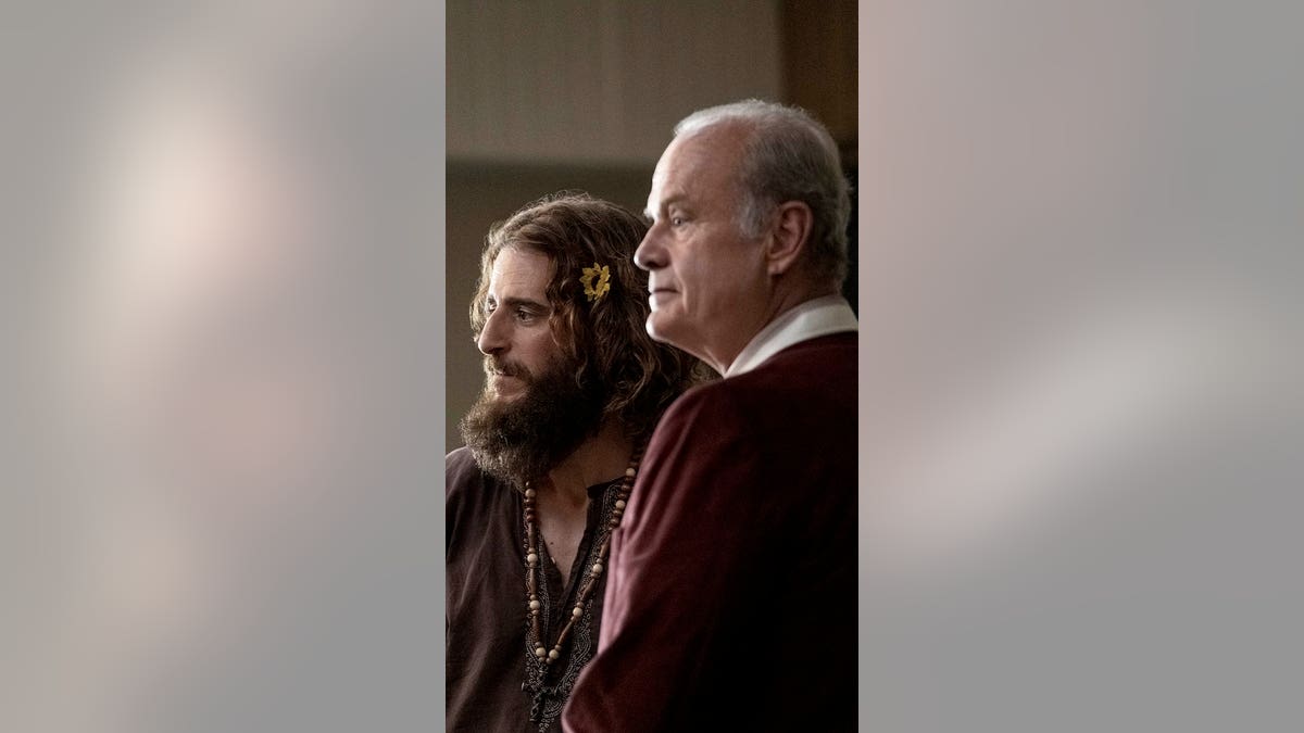 Jonathan Roumie as Lonnie Frisbee and Kelsey Grammer as Chuck Smith in Jesus Revolution. 