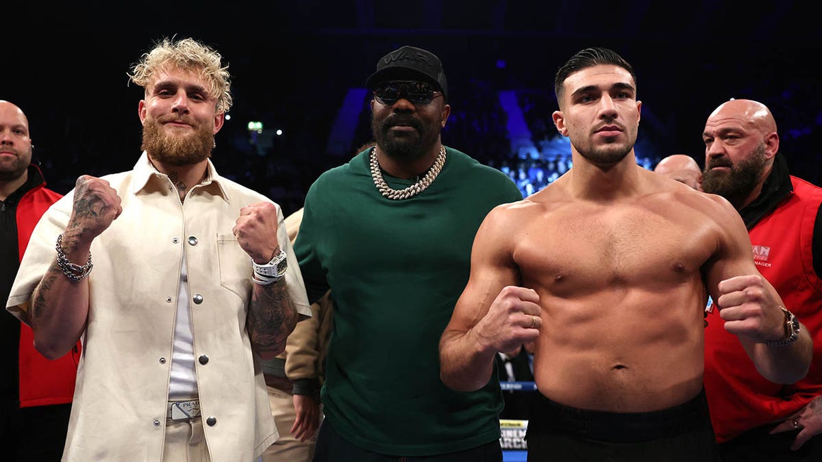 Jake Paul and Tommy Fury pose