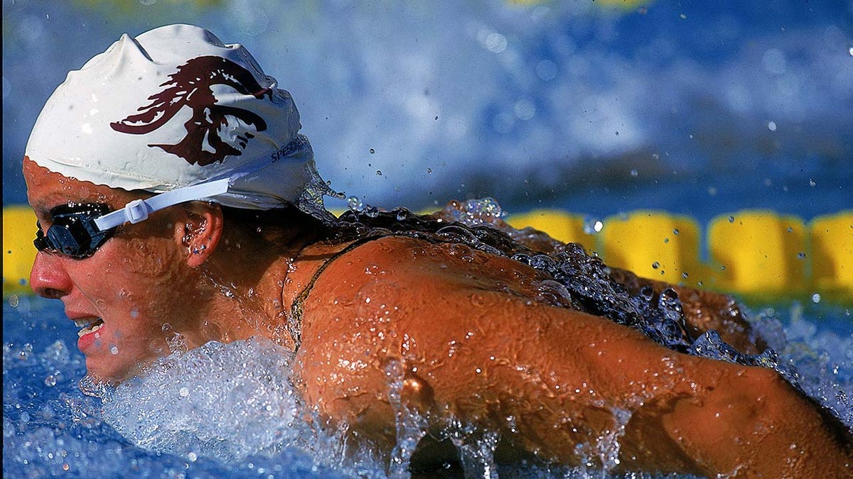 Jamie Cail swims in a competition.