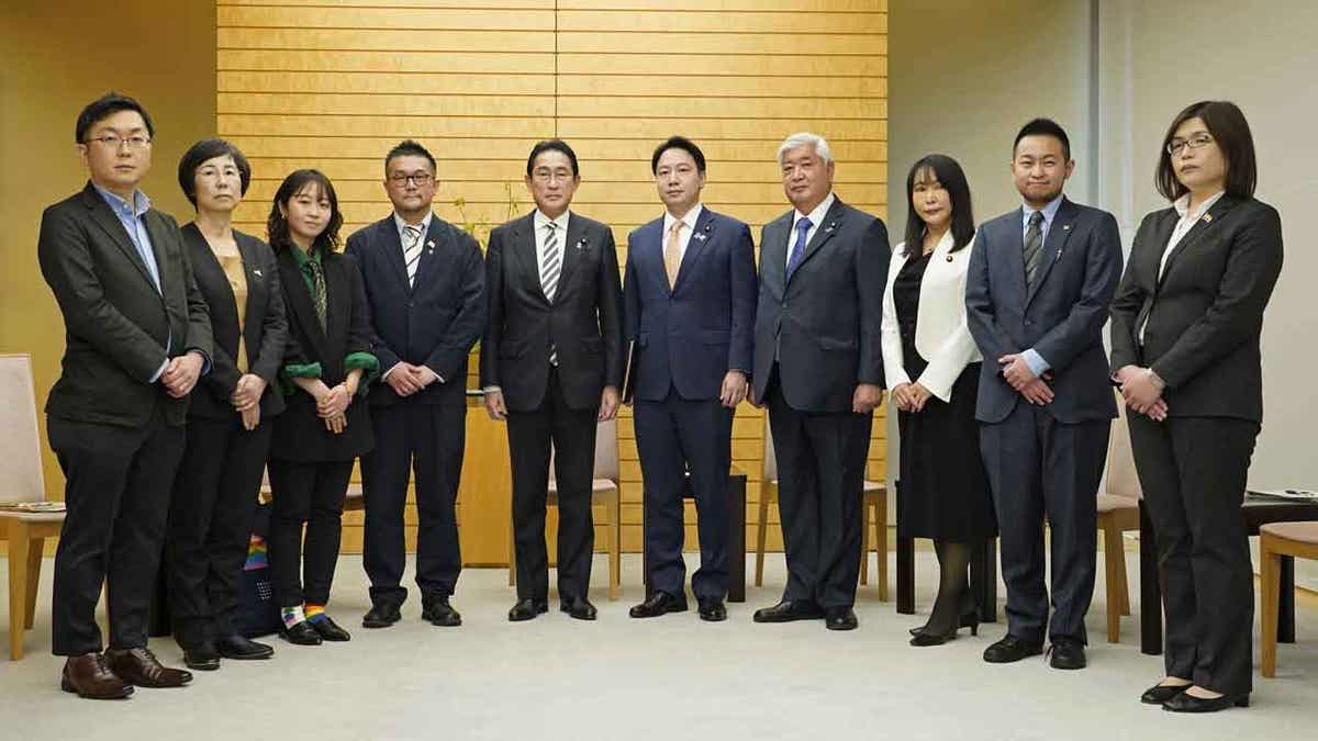 Japanese Prime Minister Fumio Kishida with staff