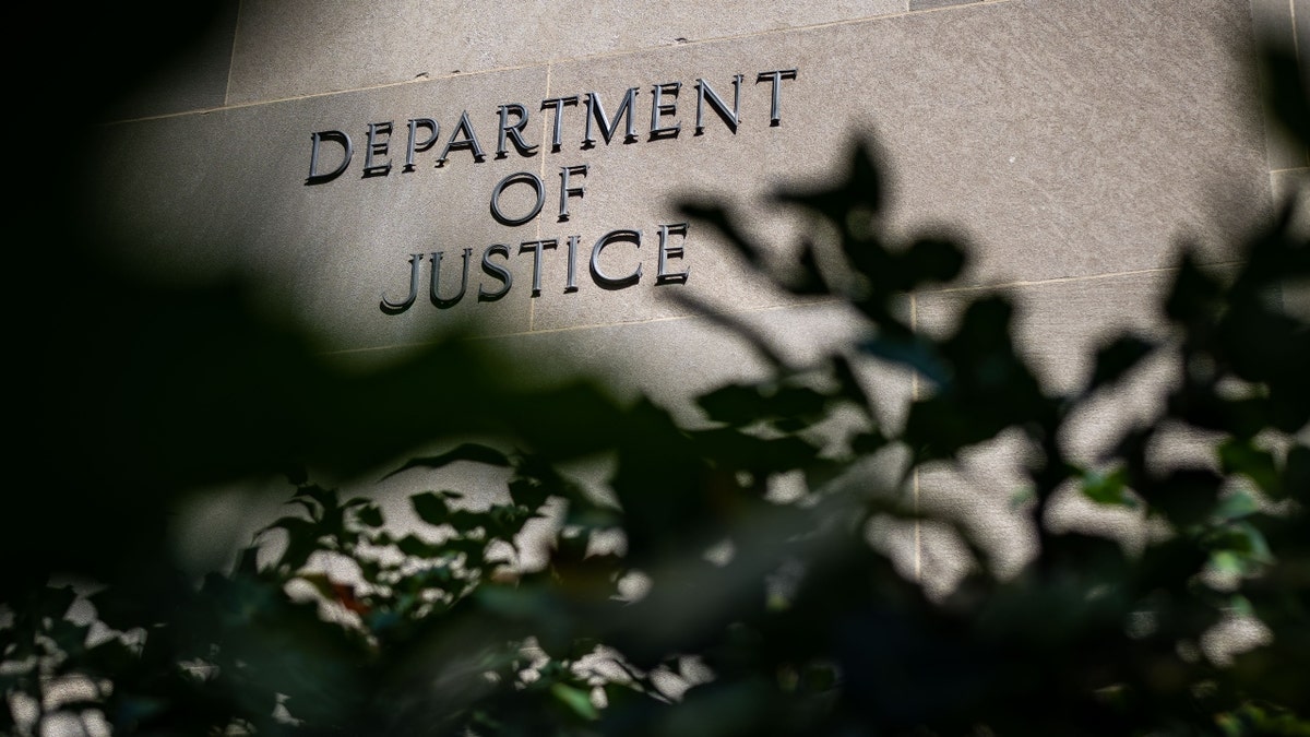 Department of Justice sign on building