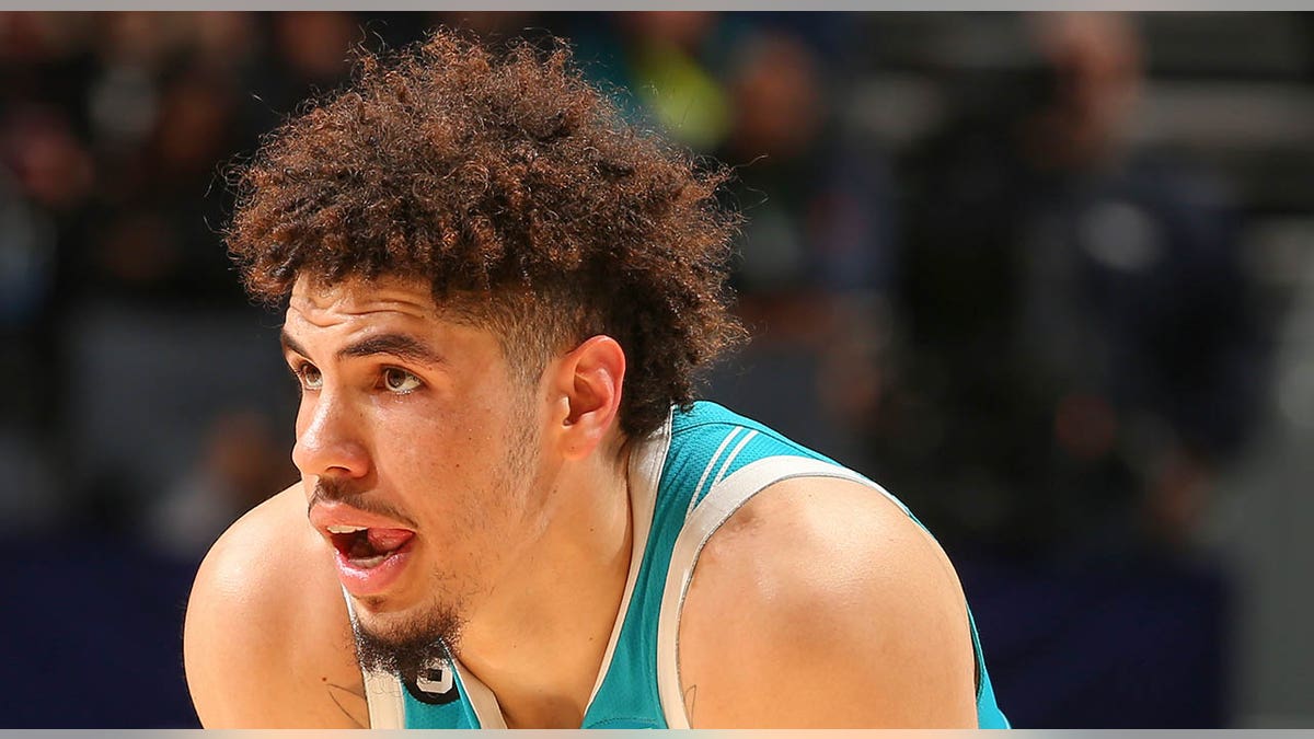 LaMelo Ball leans over