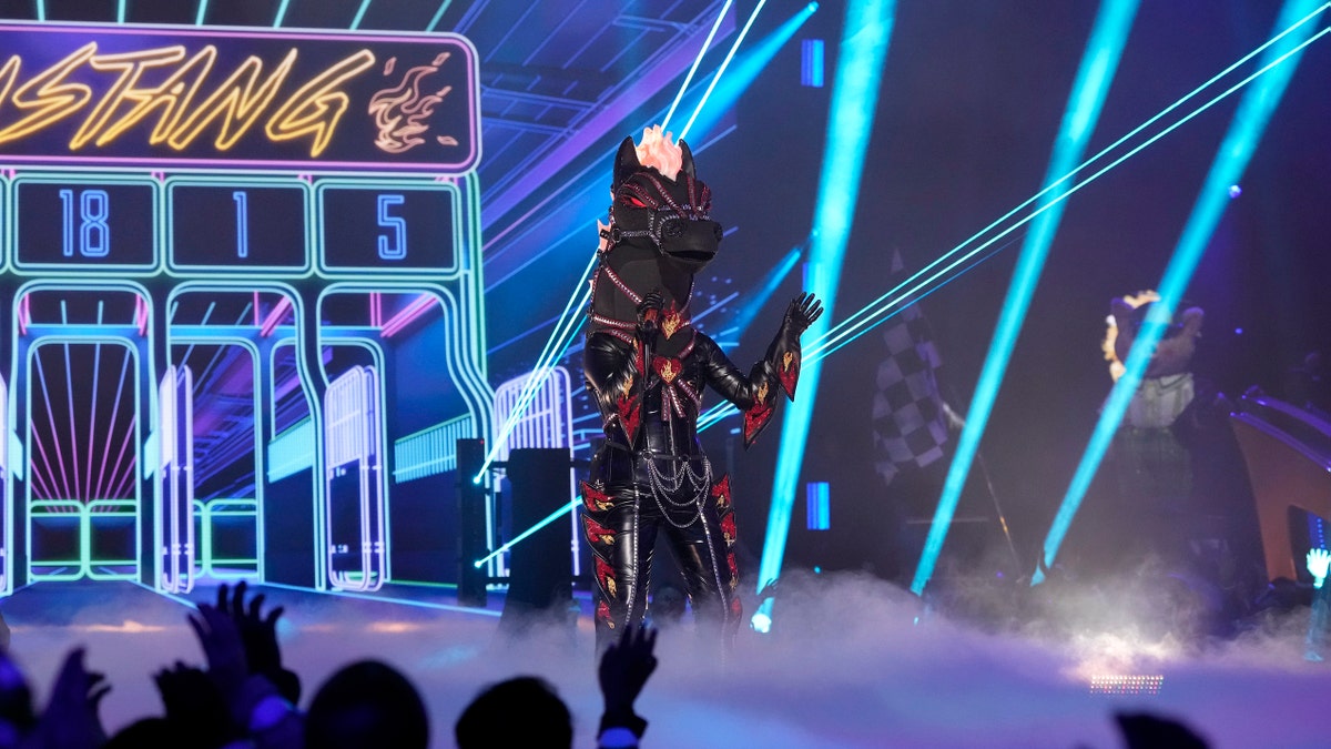 Sara Evans dressed as the Mustang on "The Masked Singer"