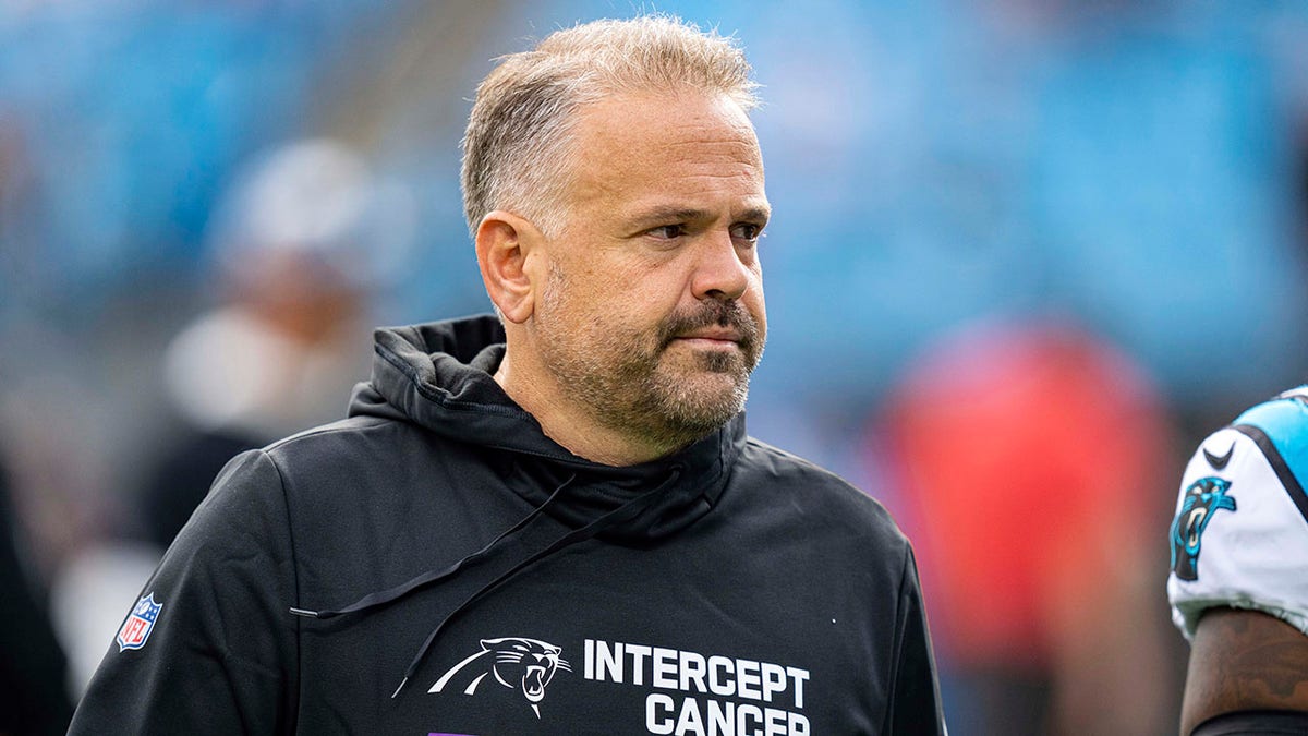 Matt Rhule looks on before an NFL game