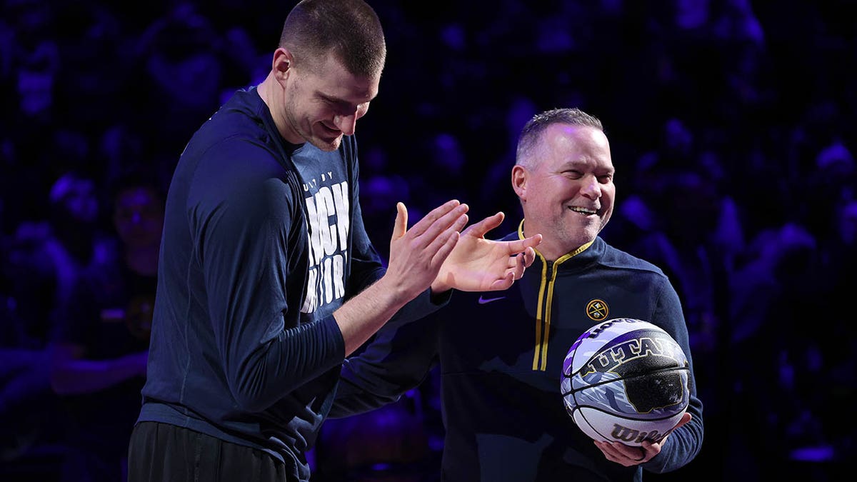 Michael Malone and Nikola Jokic