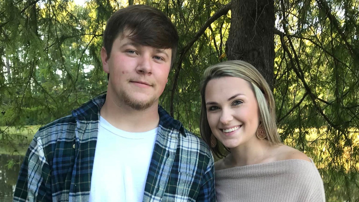 Tyler Doyle and wife smile in anniversary photo