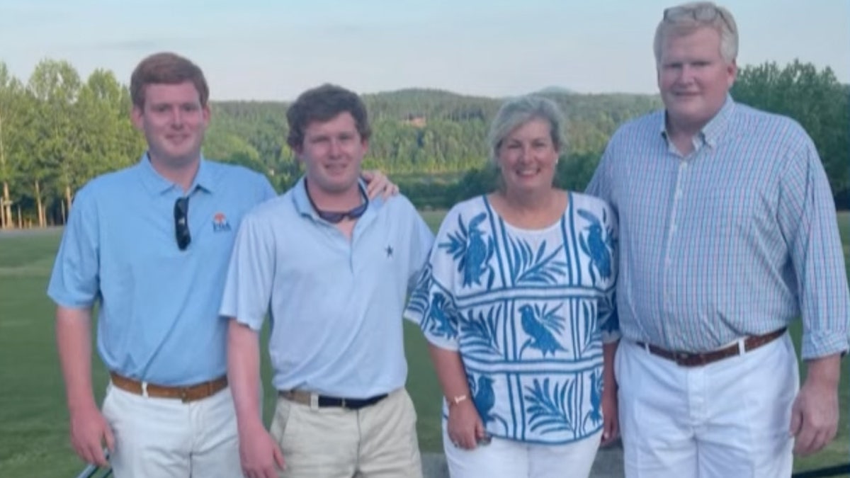 The Murdaugh family smiling in a portrait.