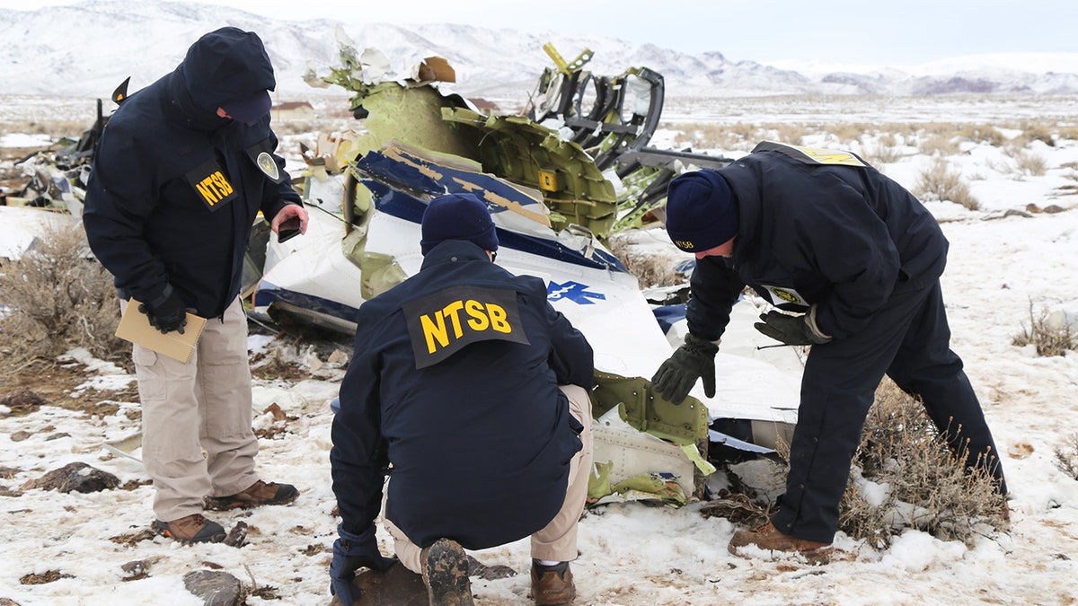NTSB investigators examining wreckage