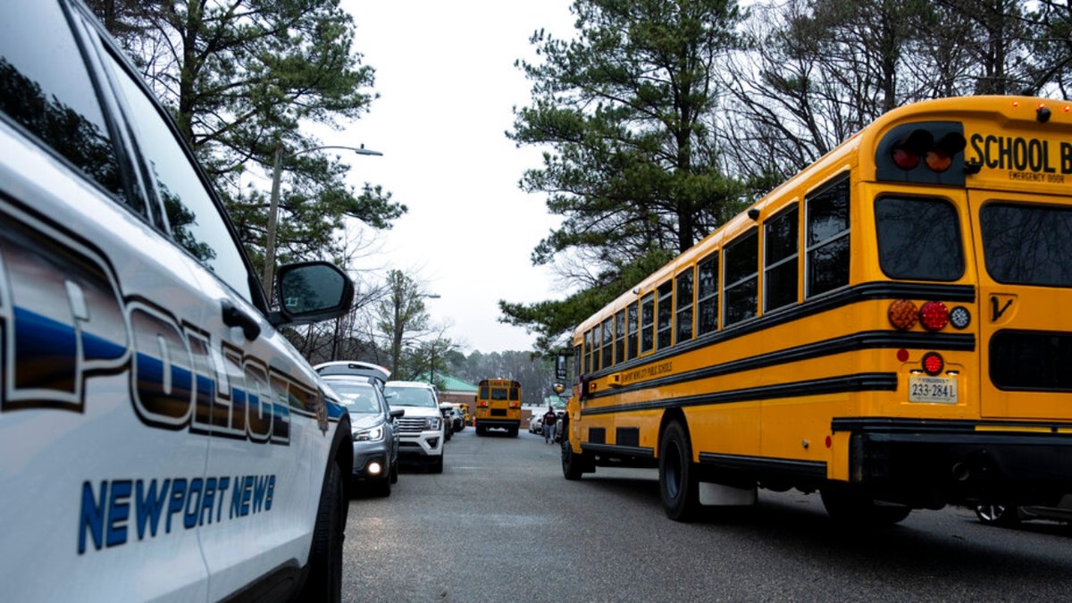 A police car and a school bus