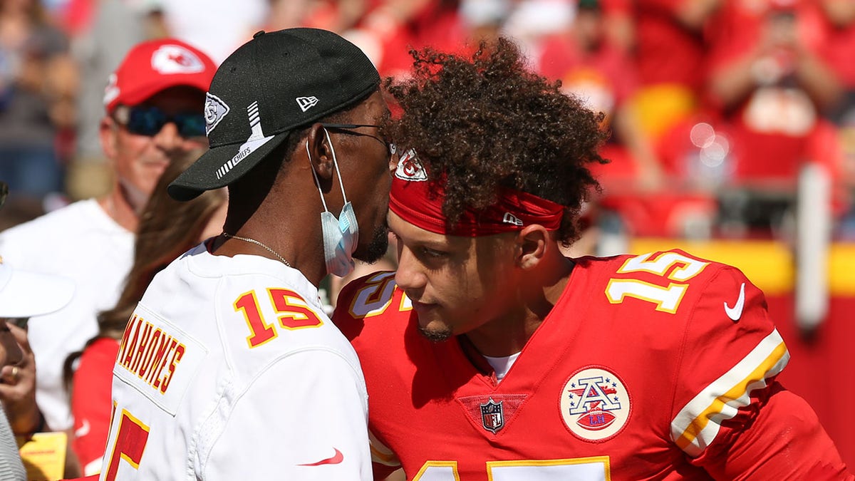 Patrick Mahomes hugs his father