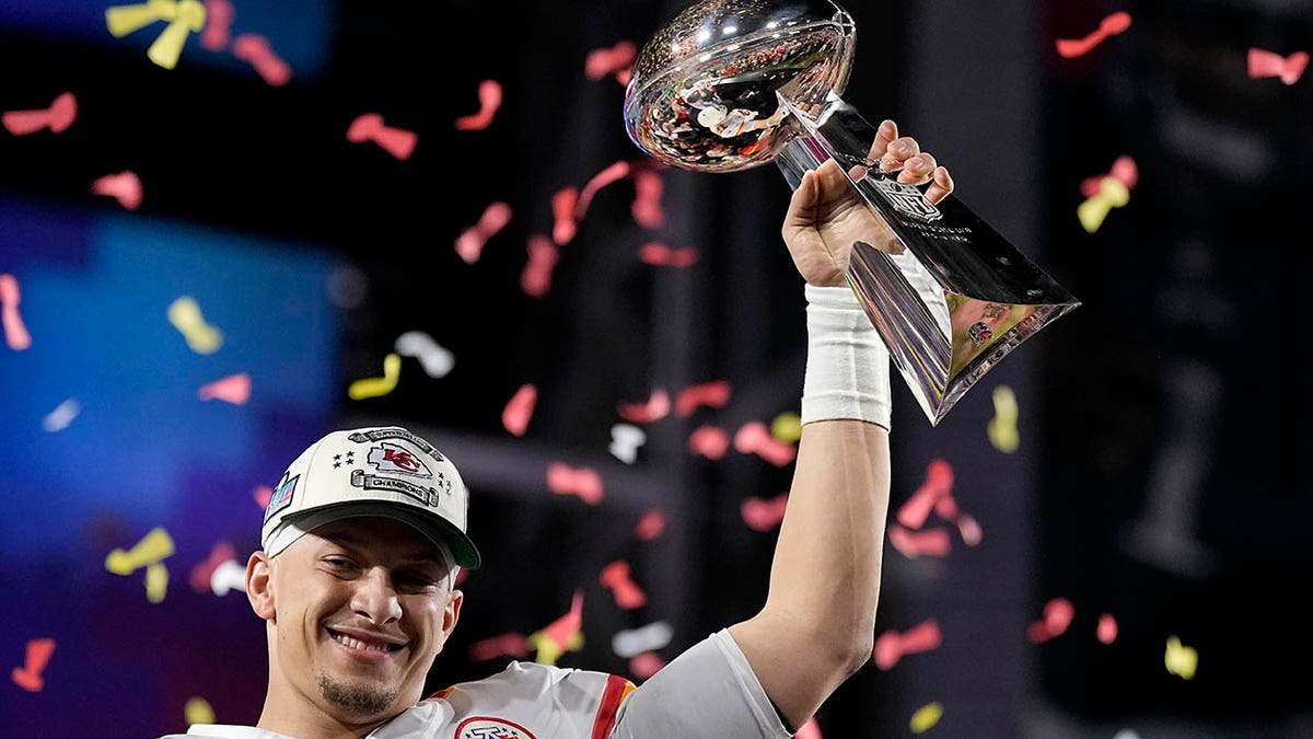 Patrick Mahomes holds the Lombardi Trophy