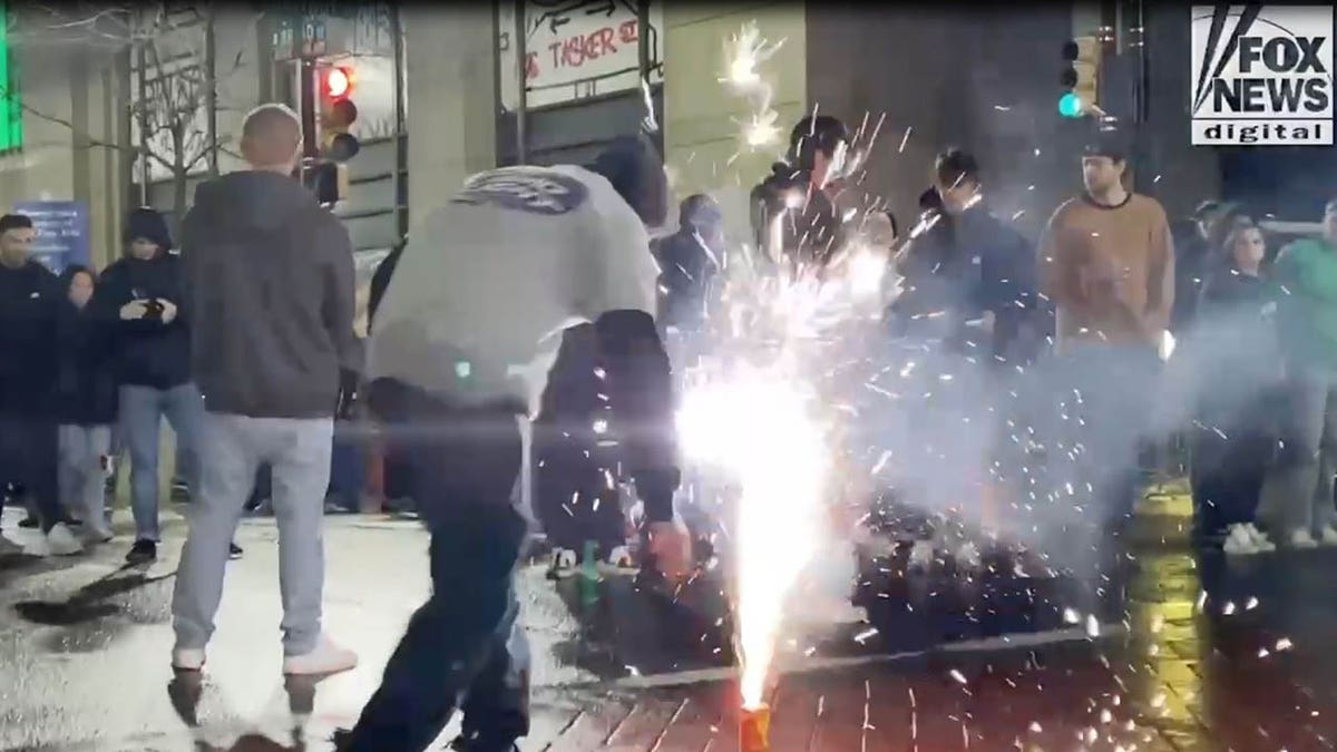 Eagles fan lights a firework