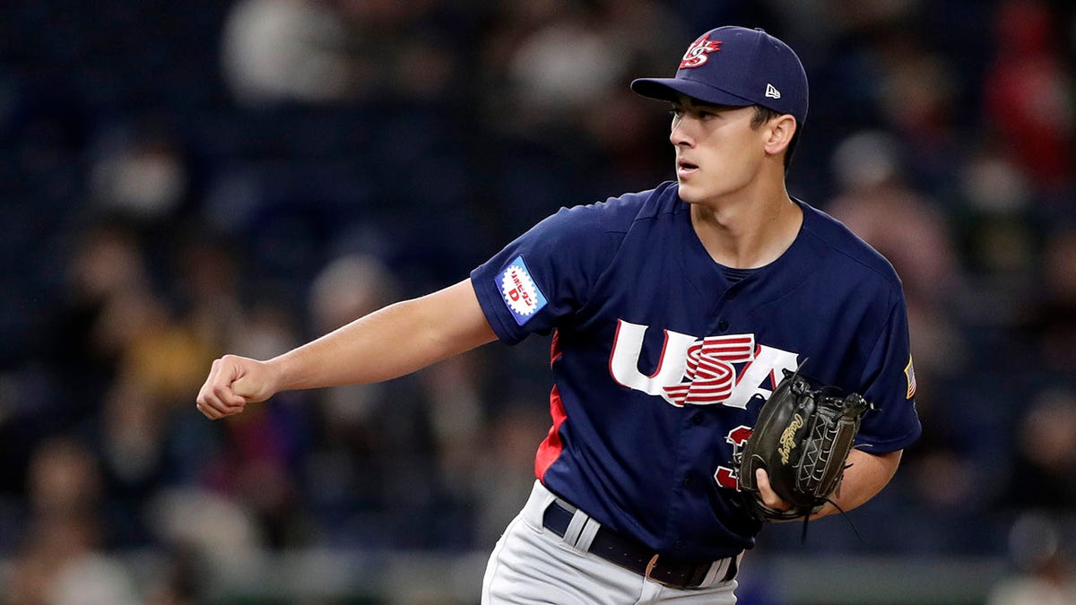 Noah Song throws a pitch in the 7th inning