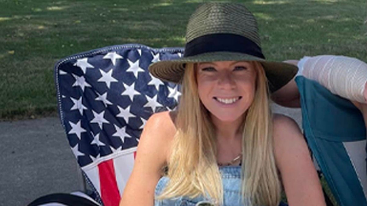 Rachel Schwartz smiles in lawn chair with hat on