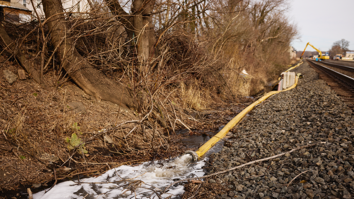 EAST PALESTINE, OH - FEBRUARY 14: Water is rerouted near the site of a train derailment on February 14, 2023 in East Palestine, Ohio. A train operated by Norfolk Southern derailed on February 3, releasing toxic fumes and forcing evacuation of residents. (Photo by Angelo Merendino/Getty Images)