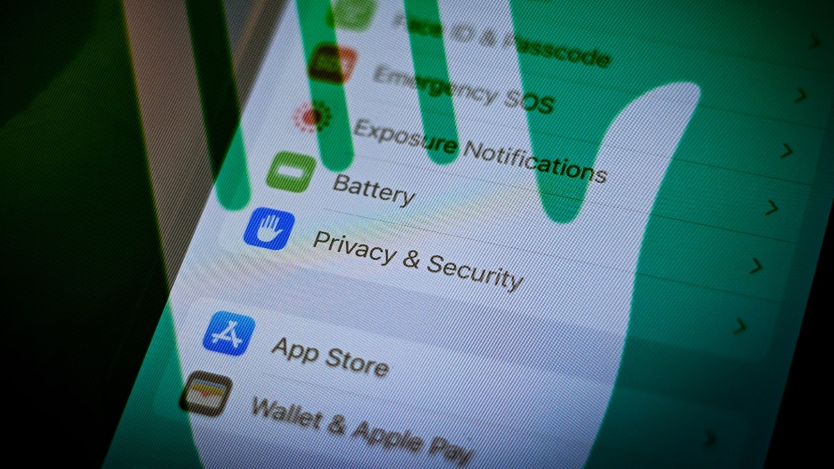 An iPhone with privacy and security settings i