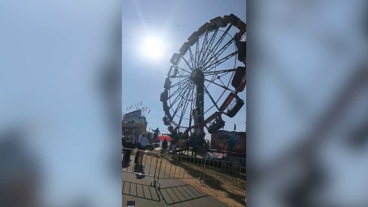 An amusement park ride at the Florida State Fair in Tampa stopped midair on Feb. 17, causing carriages to whip side to side.