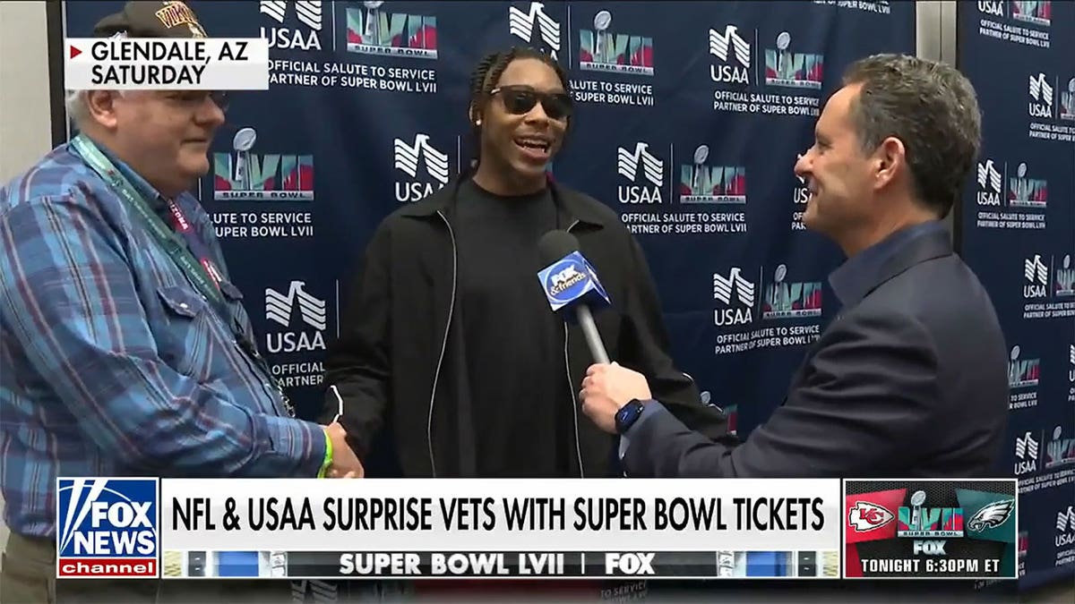 Veteran being surprised with Super Bowl tickets.