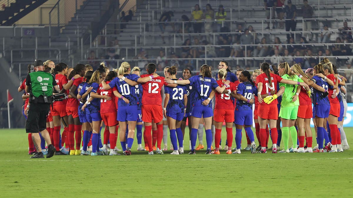 U.S. women's national soccer team embraces Team Canada