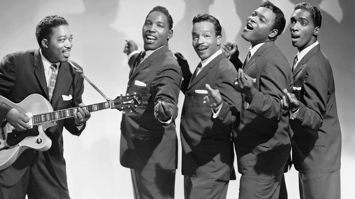Charlie Thomas and The Drifters pose for a portrait