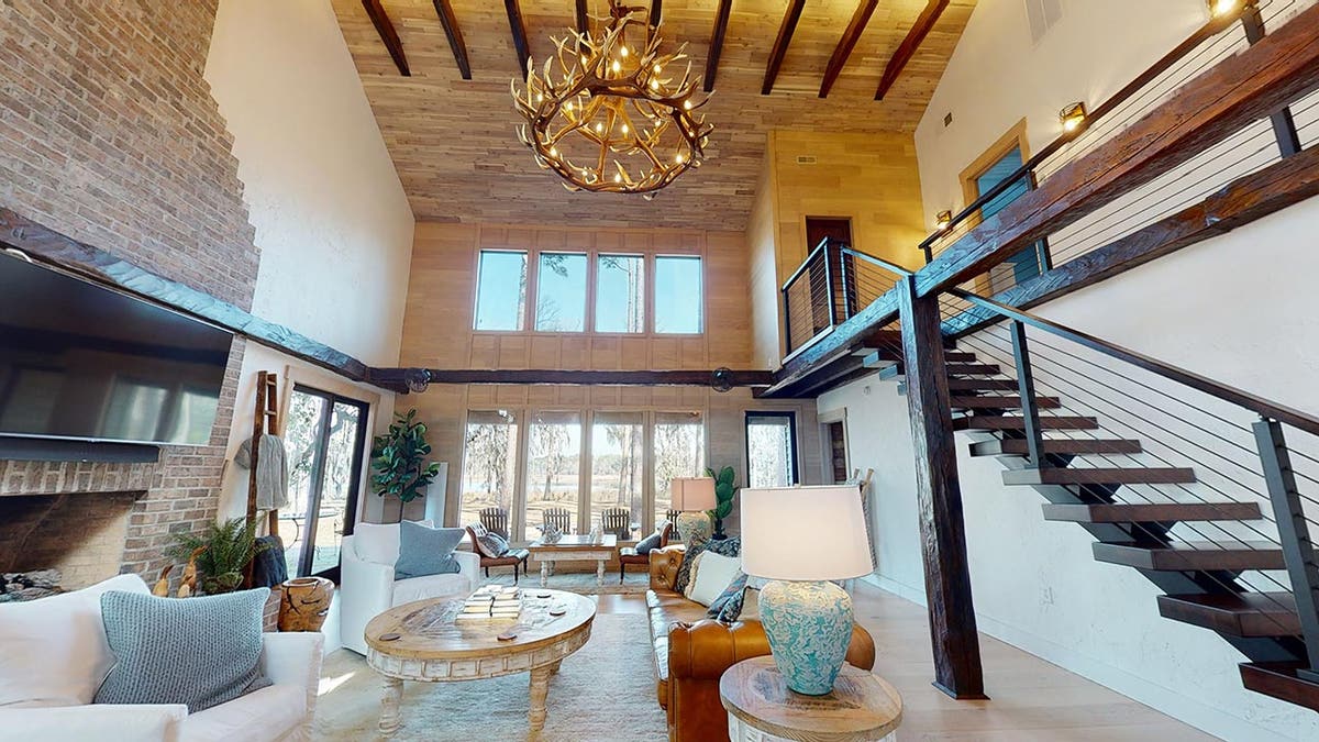 Luxurious interior of the Tobacco house with an antler chandelier