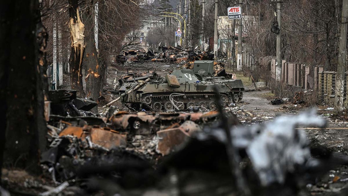 line of destroyed Russian equipment on Ukraine street