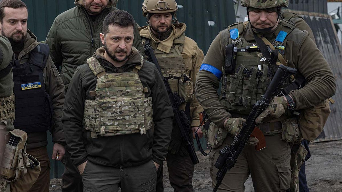 A group of men wearing military gear.