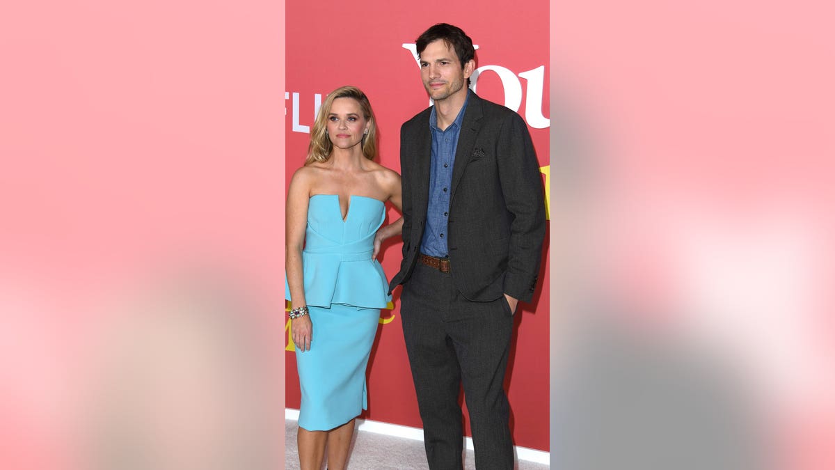 Ashton Kutcher and Reese Witherspoon at a premiere