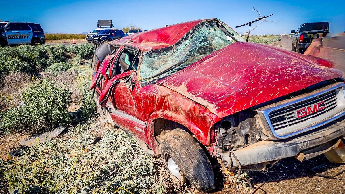 wrecked GMC SUV