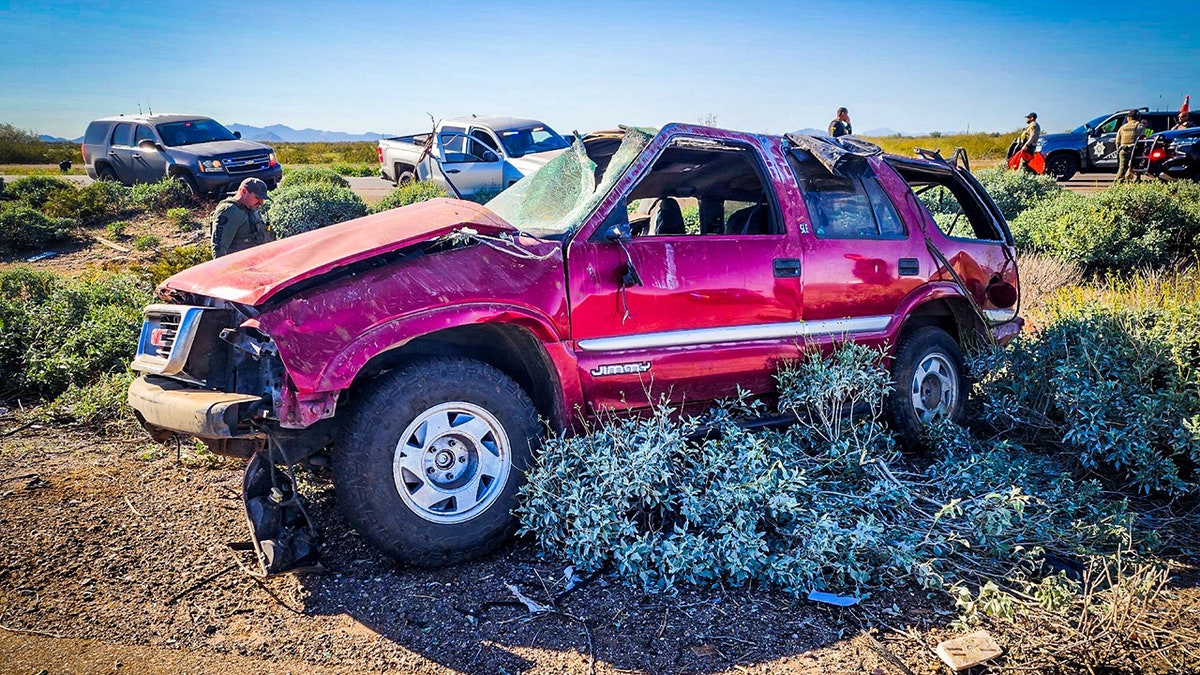 wrecked GMC SUV