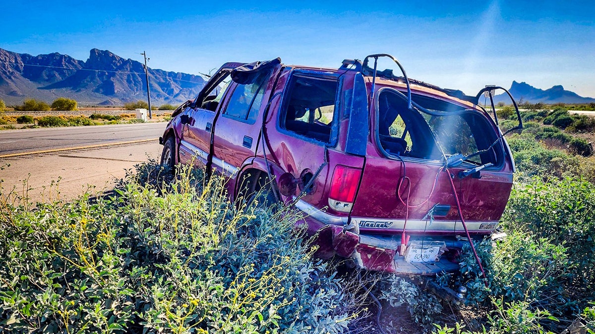 wrecked GMC SUV