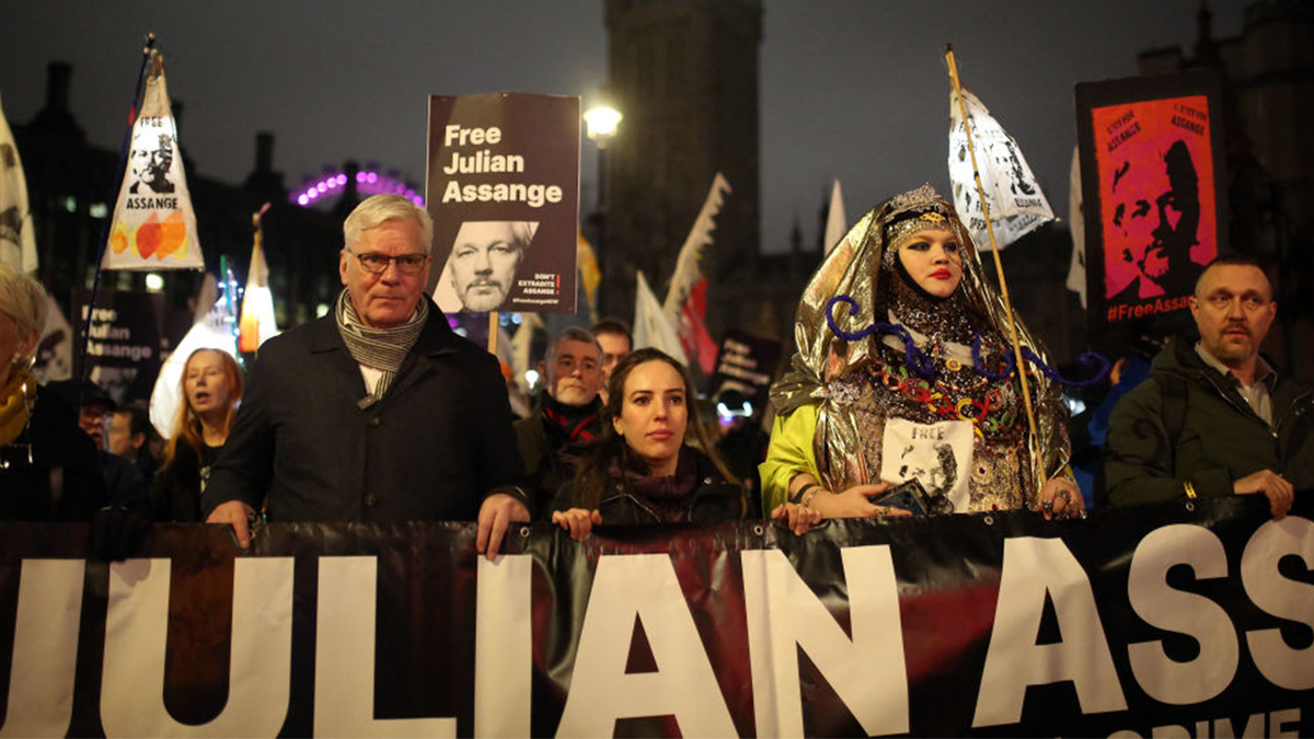 Thousands Hold 'Night Carnival' To Free Julian Assange 