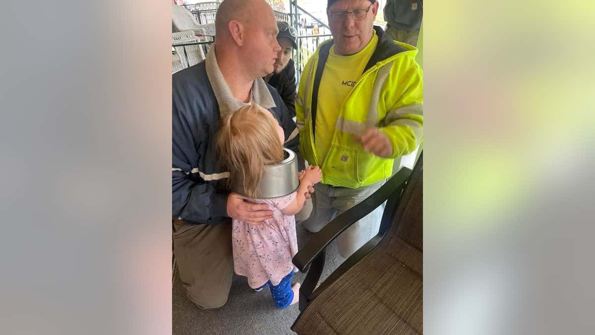 Firefighters free toddler's head from cake pan