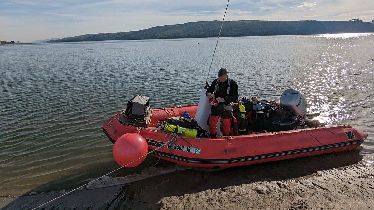 recovery diver in boat