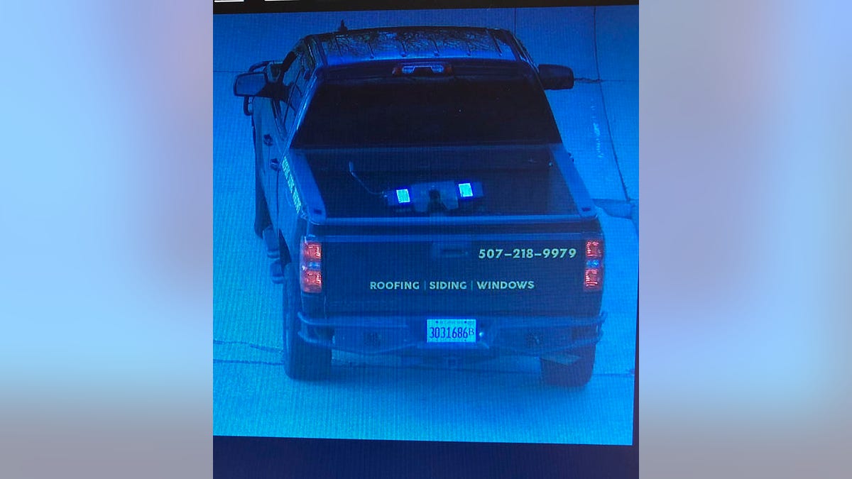 Connor Smith's truck is shown with the words "roofing siding windows" on the hatchback