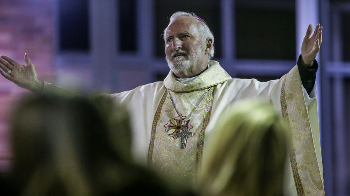 Bishop David OConnell of St. Cornelius Catholic Church, hosts a community memorial service