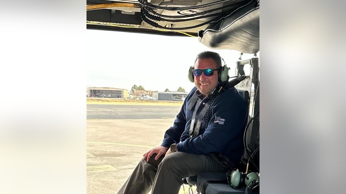 D’Esposito on helicopter at border