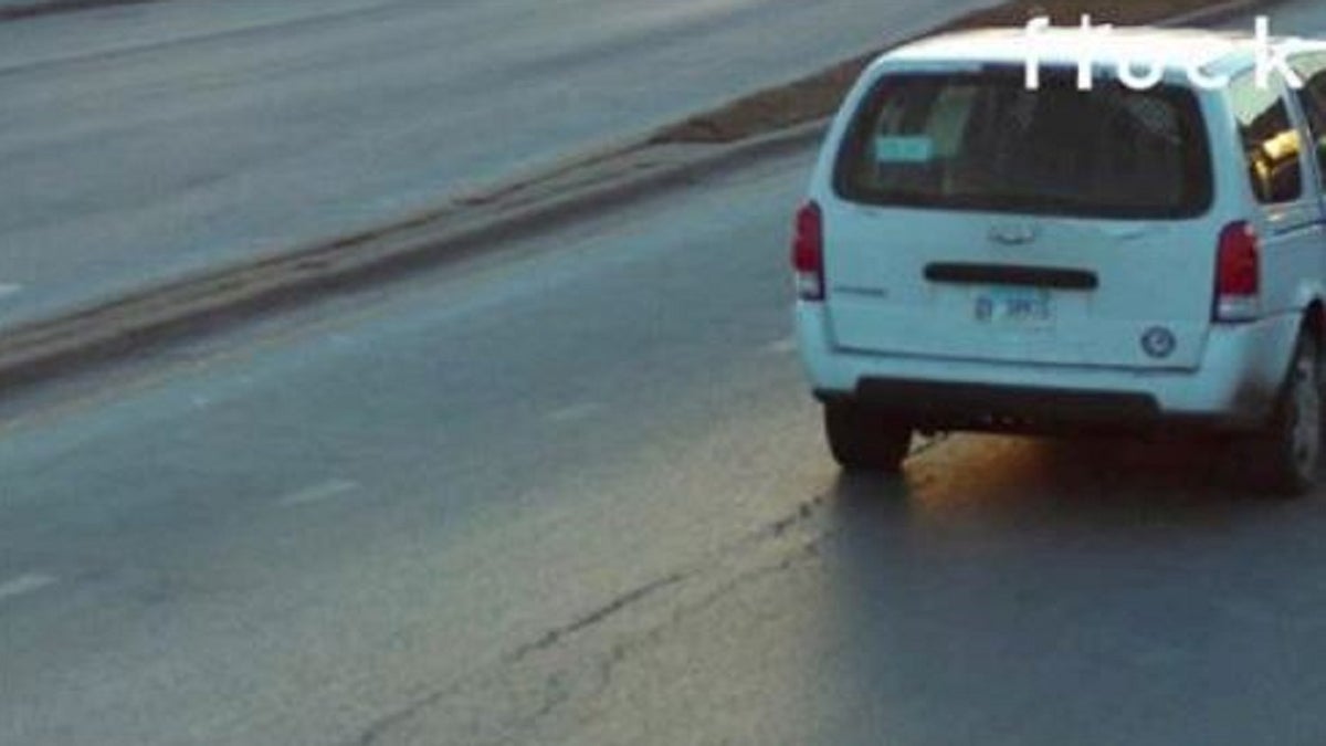 white vehicle on street