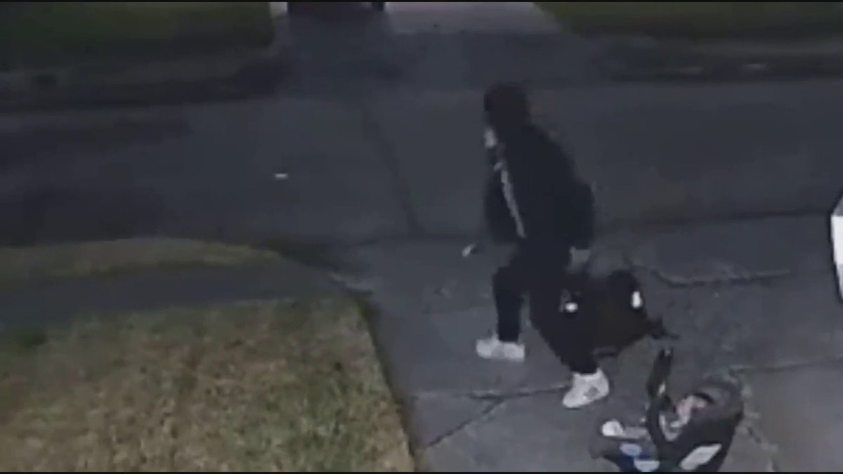 suspect running with backpack