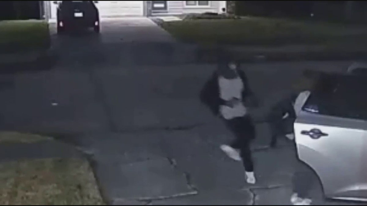 suspect running at woman from behind