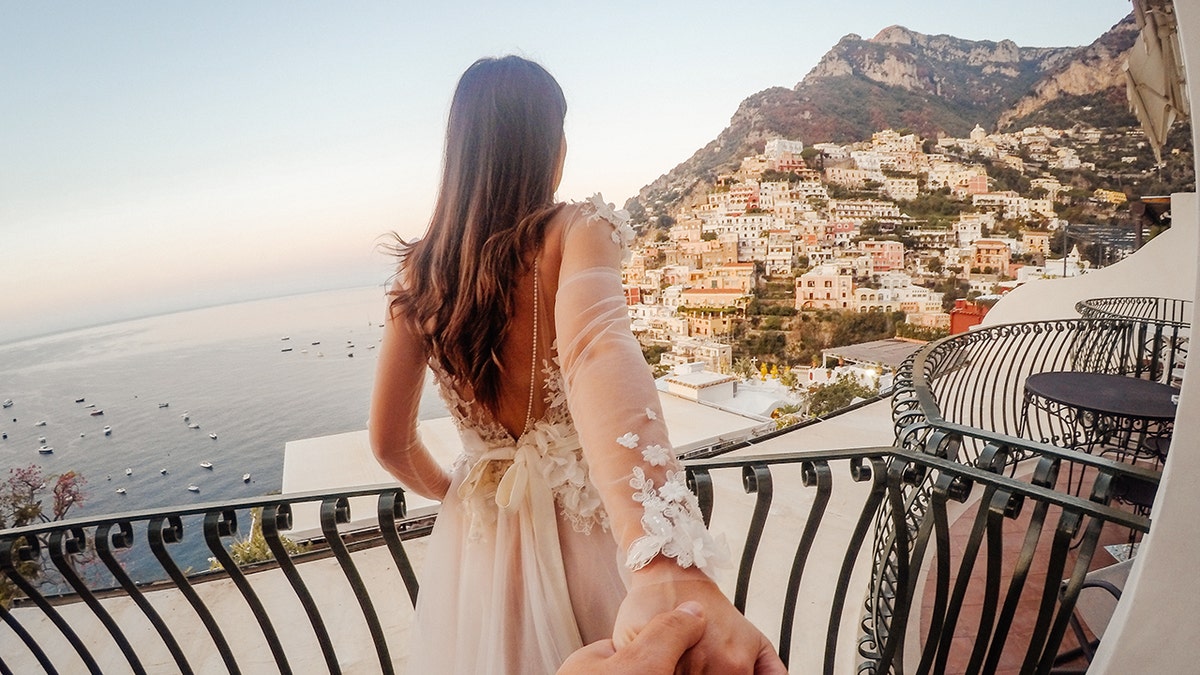 bride at railing - wedding