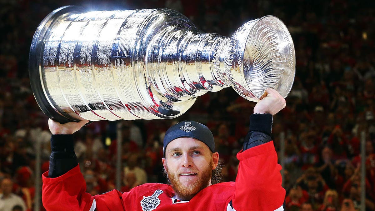 Patrick Kane with Stanley Cup